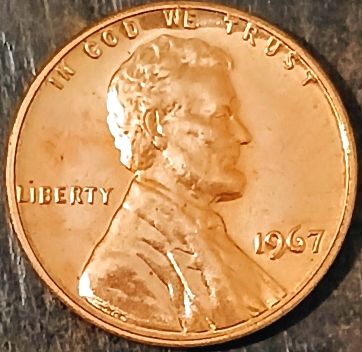 Side-by-side comparison of 1967 regular business strike penny vs 1967 SMS Special Mint Set penny