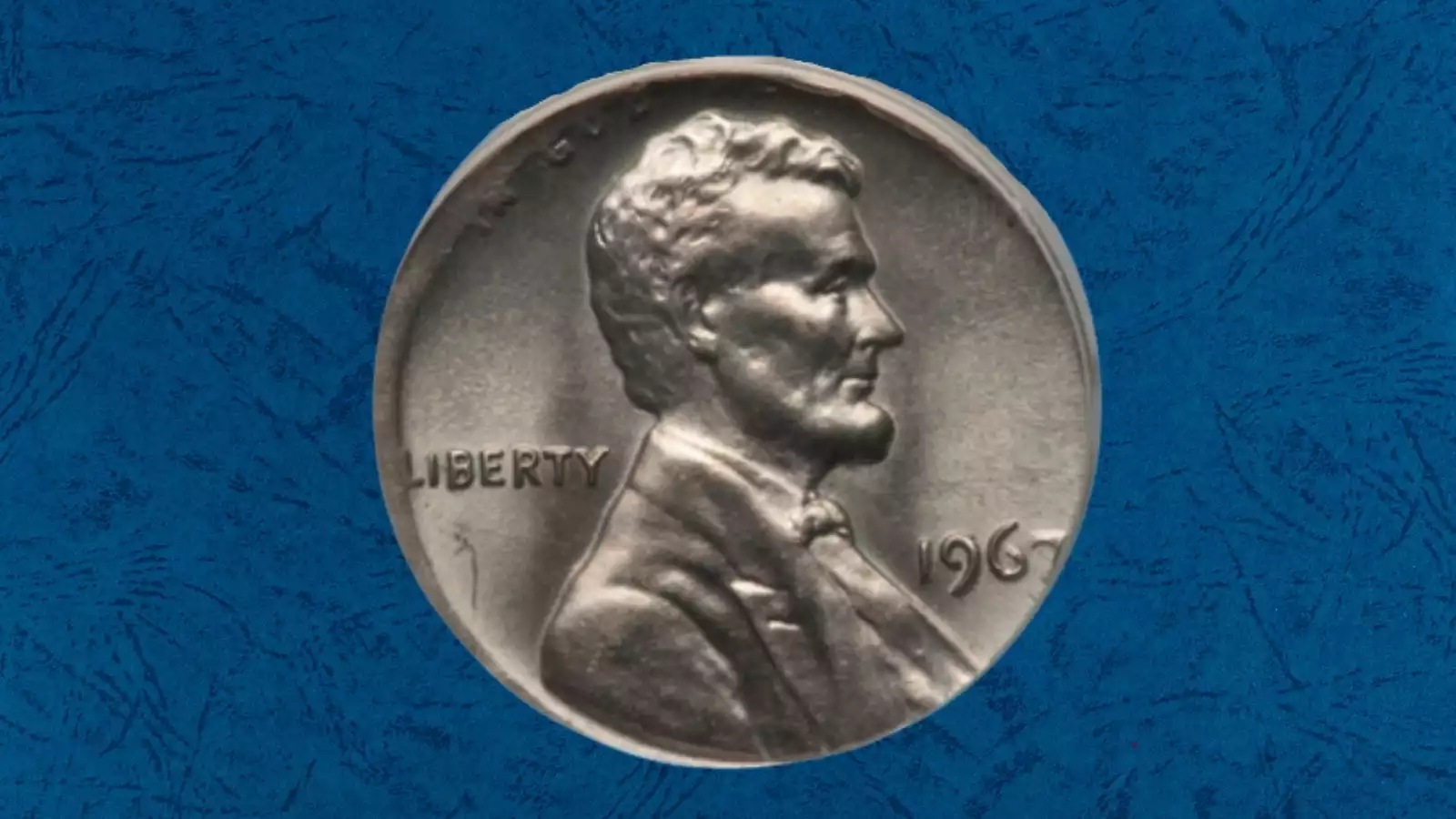 1967 penny wrong planchet error struck on a dime planchet showing silver-colored surfaces and incomplete design