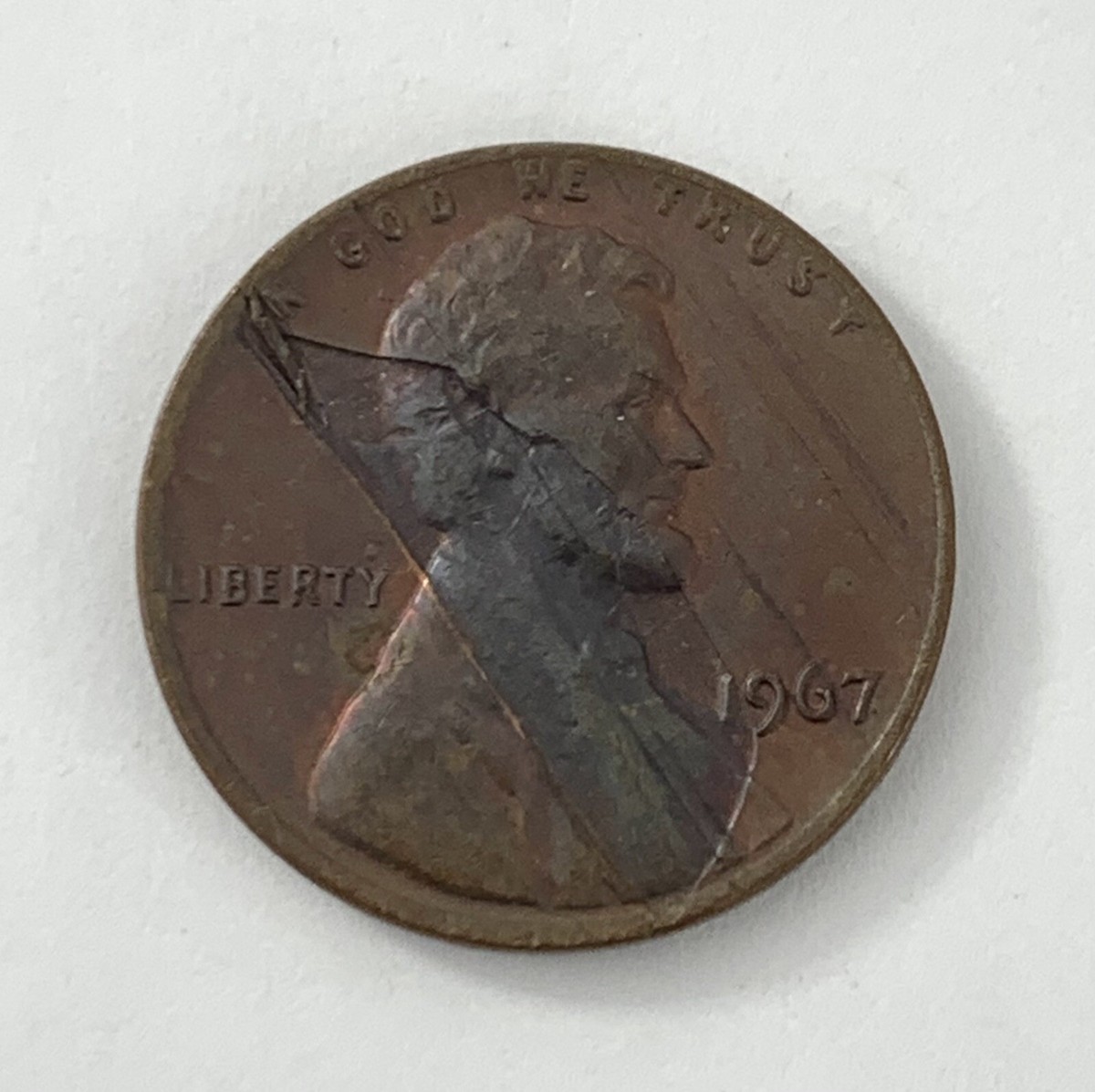 1967 penny BIE error showing a small raised vertical die crack between B and E in the word LIBERTY